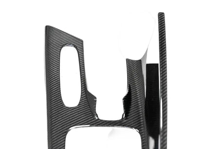 A close-up of a carbon fiber trim piece with a glossy woven pattern, shown against a plain white background with a Paragon logo watermark in the bottom right corner.